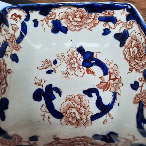 394 - A mixed lot of items including three bud vases, a Masons ring dish, and miniature lidded vanity jars... 