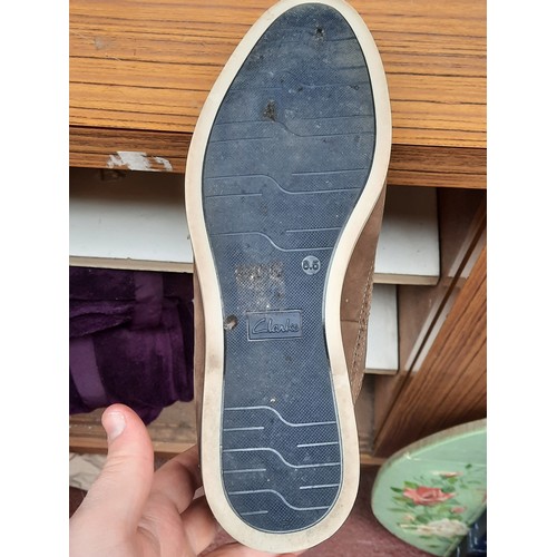 405 - A group of assorted footwear, comprising Nike Flyknit running shoes, Nike knit trainers, Adidas trai... 