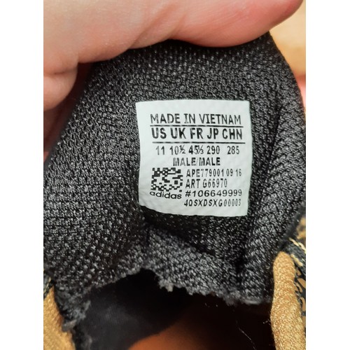 405 - A group of assorted footwear, comprising Nike Flyknit running shoes, Nike knit trainers, Adidas trai... 