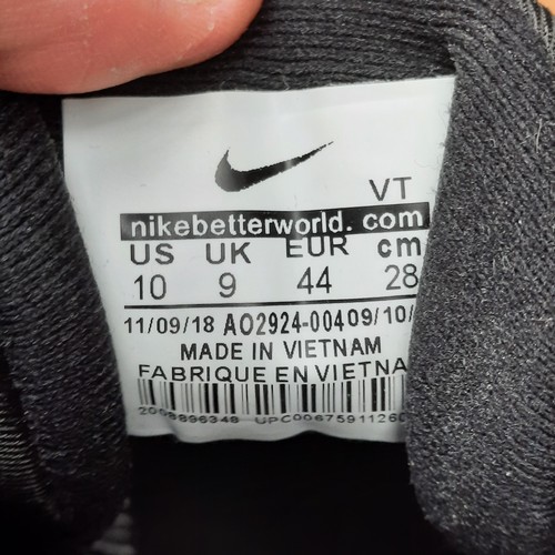 405 - A group of assorted footwear, comprising Nike Flyknit running shoes, Nike knit trainers, Adidas trai... 