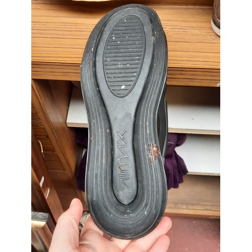 405 - A group of assorted footwear, comprising Nike Flyknit running shoes, Nike knit trainers, Adidas trai... 