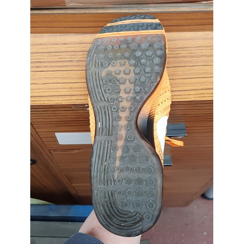 405 - A group of assorted footwear, comprising Nike Flyknit running shoes, Nike knit trainers, Adidas trai... 