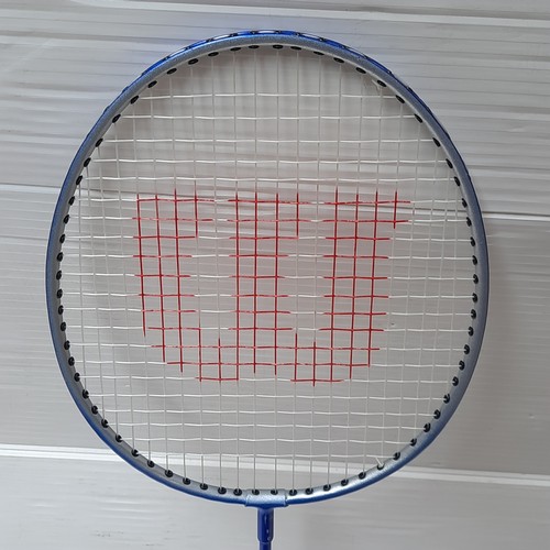 439 - Wilson Badmington equipment comprising 3 Wilson rackets and a blue Wilson zip carry case, with 2 Wil... 
