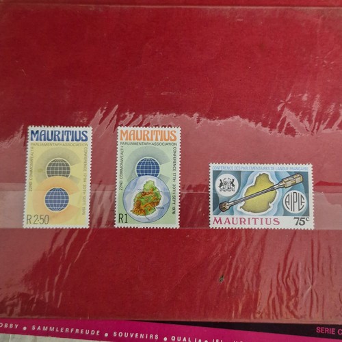 377 - A vintage stamp album, loose irish stamps on paper and a selection of 195Os letters with irish stamp... 