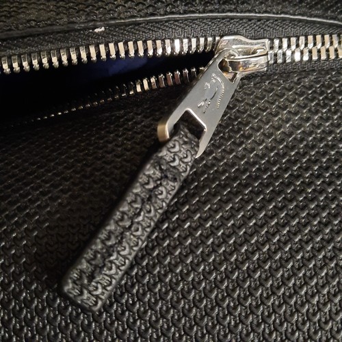 270 - A super stylish gentleman's Lacoste black cow leather weekend travel bag. Brand new with tags. RRP €... 