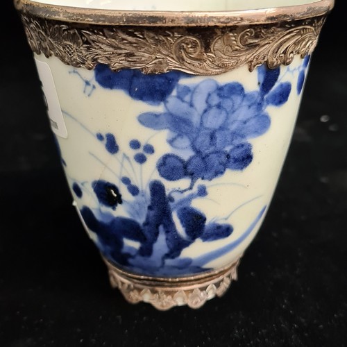 185 - A beautiful antique porcelain cup decorated in a traditional hand painted blue and white colour pall... 