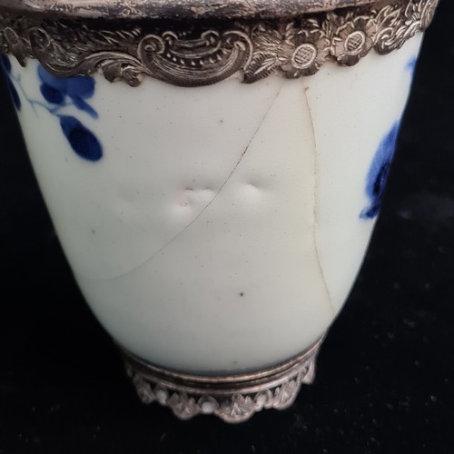 185 - A beautiful antique porcelain cup decorated in a traditional hand painted blue and white colour pall... 