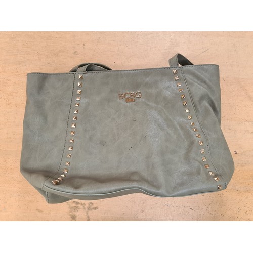 400 - Seven hand bags including a with tags studded BCBG Paris example RRP 109€, a 100% leather shoulder b... 