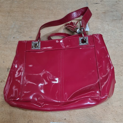 400 - Seven hand bags including a with tags studded BCBG Paris example RRP 109€, a 100% leather shoulder b... 