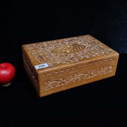 286 - A intricately hand carved and inlaid bone Anglo Indian box with lining to interior.