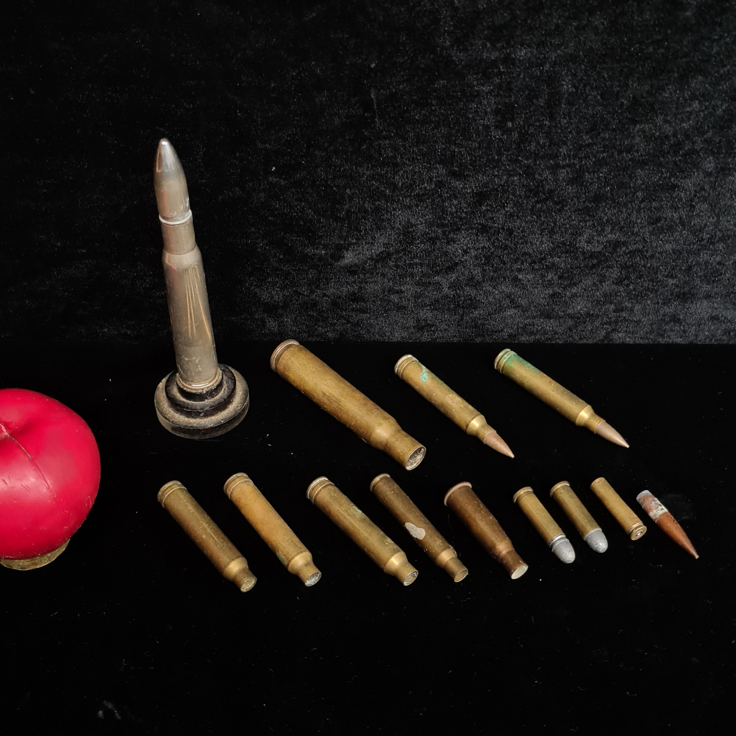 A selection of WWII brass bullet casing shells including WW Super 300 ...
