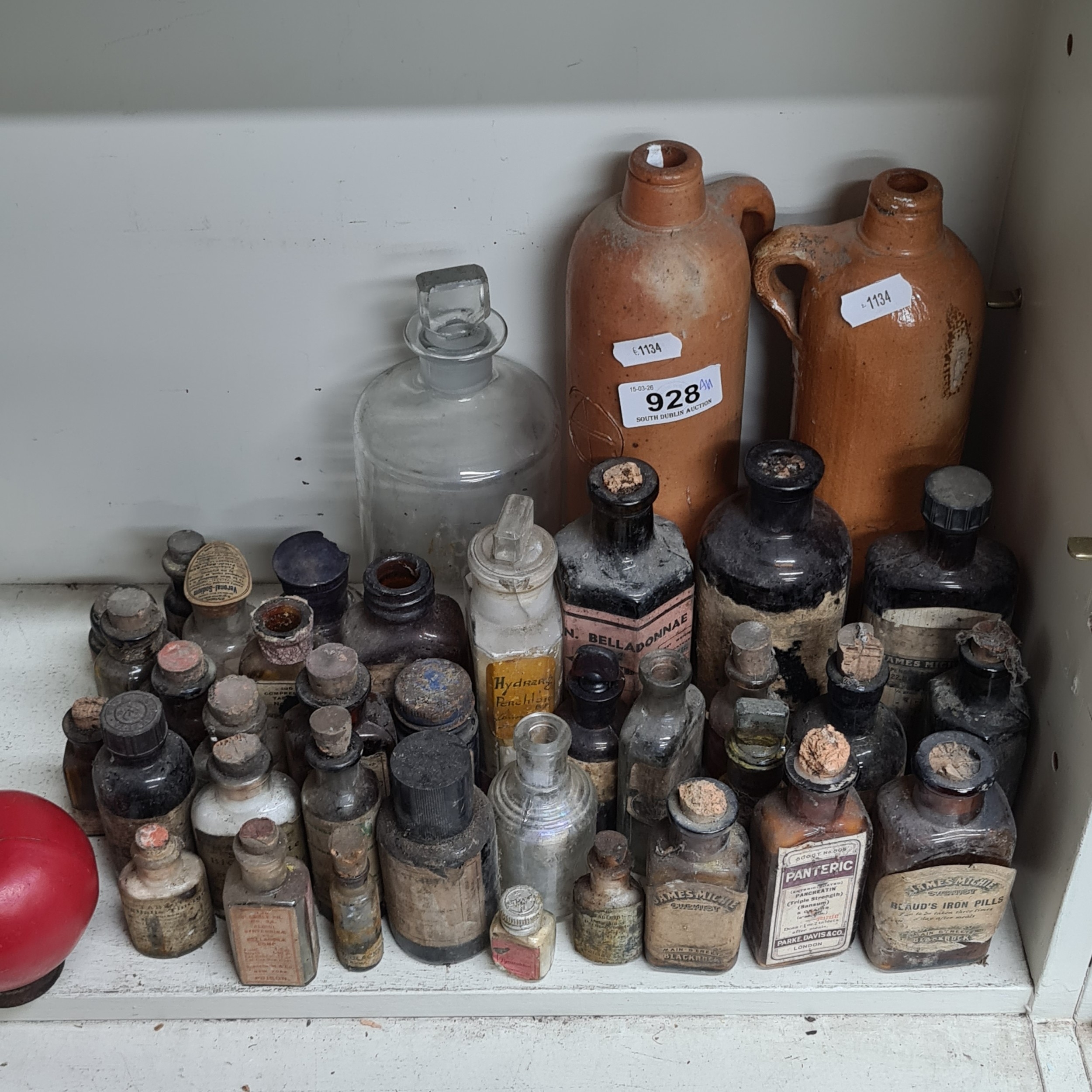 A large super collection of antique Apothecary bottles and medicines ...
