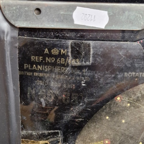 A vintage astronomical planisphere, specifically a 