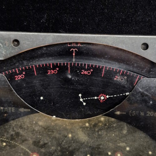 A vintage astronomical planisphere, specifically a 