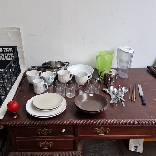 A group of assorted household kitchenwares, including ceramic mugs ...