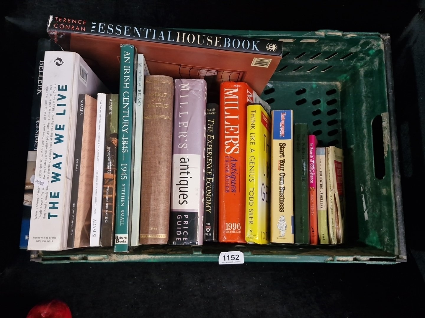 A group of assorted hardback and paperback books, including antiques ...