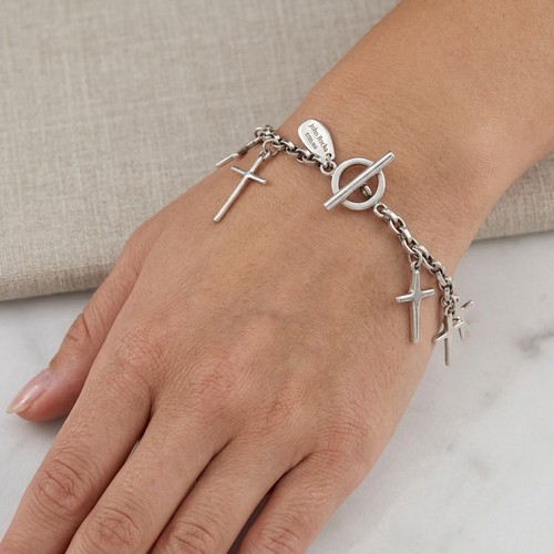 A John Rocha Sterling Silver 925 cross charm bracelet. Weight