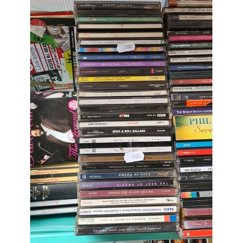 A quantity of compact discs, various genres including classical and ...
