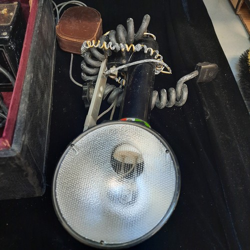 158 - A Lenza Bronica carry case containing two vintage 1960's Multiblitz camera flashes and Multiblitz Ju... 