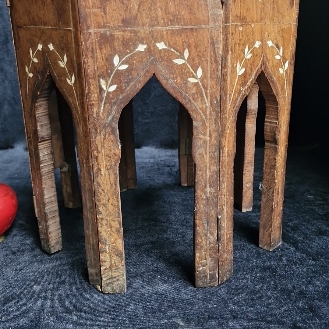Inlaid hardwood octagonal occasional table, the top centred by a ...