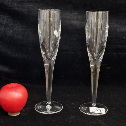 123 - Two elegant John Rocha Waterford Crystal glasses. These flutes are from the Geo Collection.  Both in... 