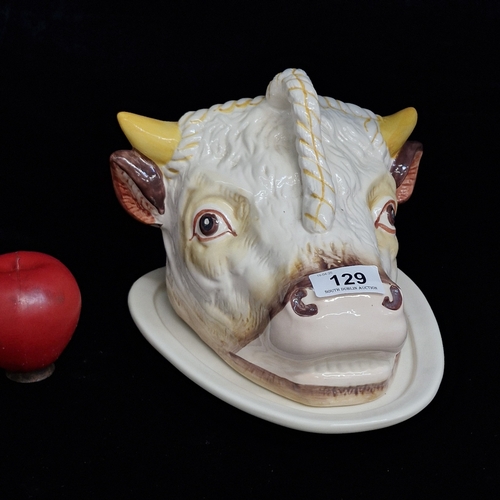 129 - A fabulous hand painted ceramic butter / cheese dish in the form a Cow. In good condition. I do find... 