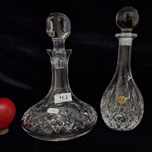 162 - Two quality cut crystal decanters including a ships decanter, and further example. Both in good cond... 
