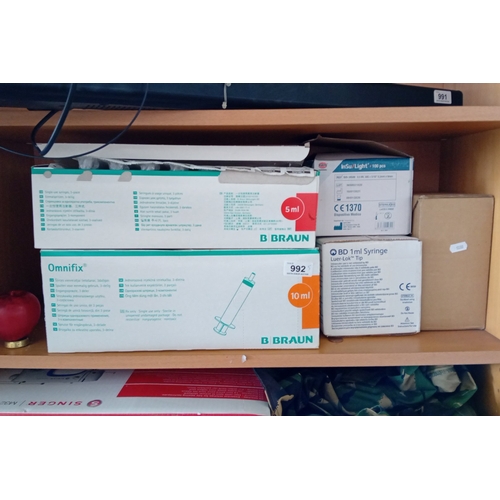 Five boxes of disposable medical syringes and injection supplies ...