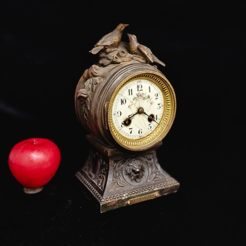 181 - Star Lot: A charming late 19th/early 20th century French eight day mantel clock titled 