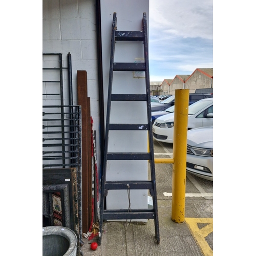 A tall 7 Rung Painter’s timber step ladder, painted black, of A-frame ...