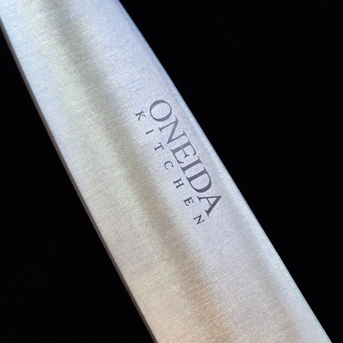 169 - An as new unused Oneida two piece knife and fork carving set in original wooden case.