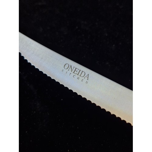 170 - An eight piece Oneida steak knife set housed in original wooden case.