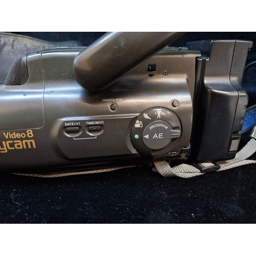 174 - A vintage Sony Video 8 HandYcam video camera recorder CCD-FX200E with cables and travel bag.