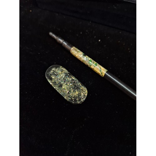 179 - A nice lot of Vietnamese chopsticks and chopstick rests featuring Mother of Pearl accents. Housed in... 