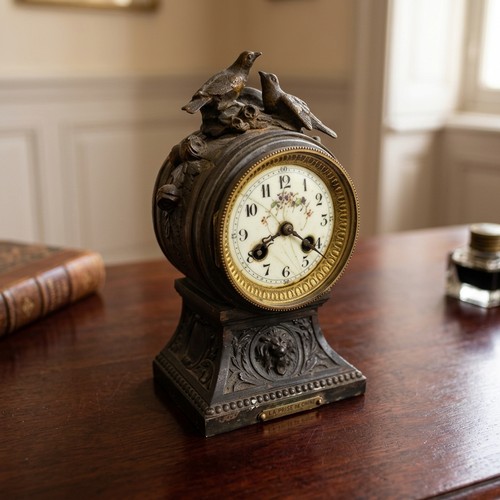 181 - Star Lot: A charming late 19th/early 20th century French eight day mantel clock titled 