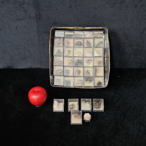 A collection of small mineral specimens, often referred to as a ...