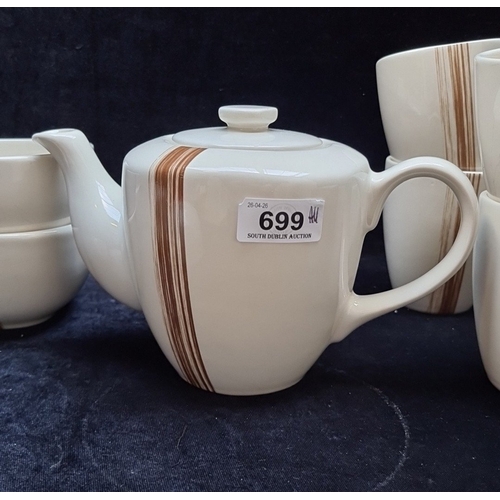 A Rayware glazed stoneware tea service with brown striped decoration ...