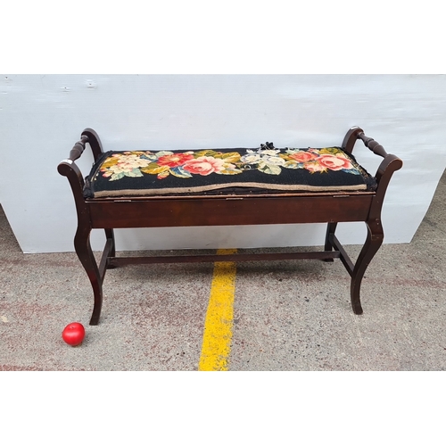 A handsome Edwardian long needlework-upholstered ottoman bench with ...