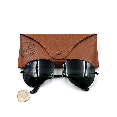 30 - A pair of Ray Ban Aviator style glasses. Lens with slight blemish. Comes in original Ray Ban pouch. ... 
