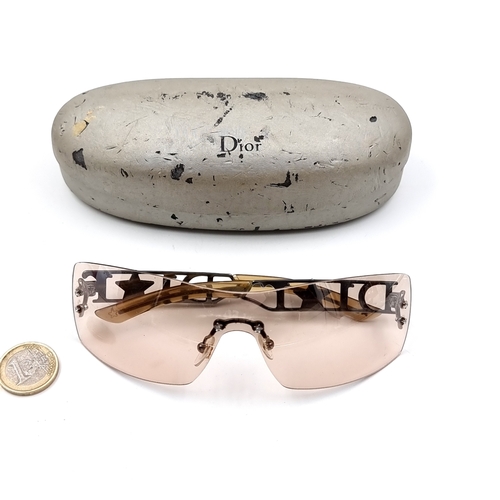 31 - A  stunning pair of rare vintage Dior Diorlywood rimless shield sunglasses. From John Galliano's ten... 