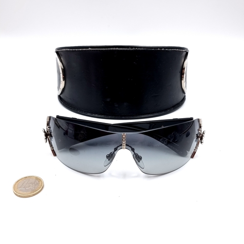 33 - A pair of designer Bvlgari designer large wrap round sunglasses with spray design gemstone accents. ... 