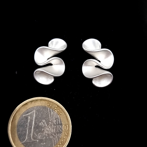 35 - A pair of Sterling Silver leaf designed stud earrings. Weight - 3.5 grams. Please note, the image of... 