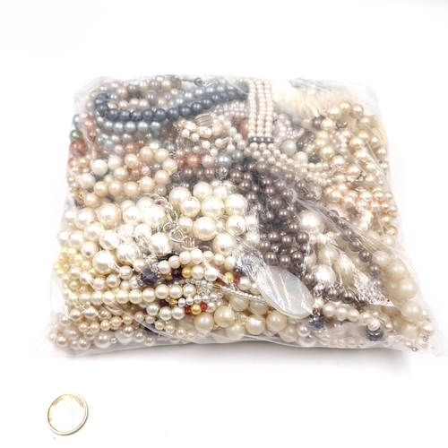 46 - A very large bag of assorted Pearl necklaces. Weight - 1570 grams.