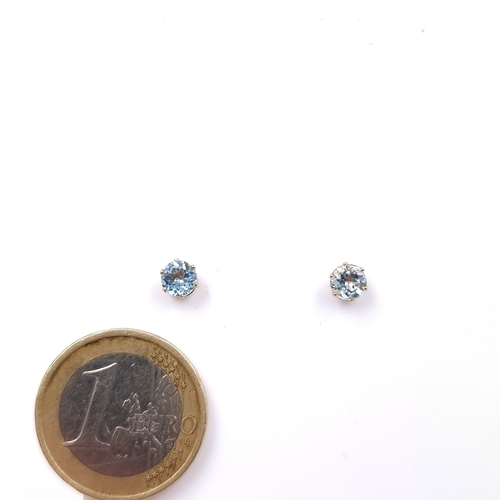 5 - Star Lot : A pretty pair of Blue Topaz gemstone earrings. Mounted in nine carat gold. Weight - 0.54 ... 
