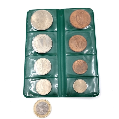 60 - A 1966 Irish coin set complete from farthing to half crown. Brilliant uncirculated in original green... 