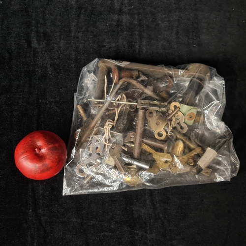 A large collection of vintage keys. Lot includes a plethora of examples ...