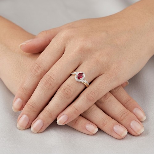 2 - Star Lot: A stunning Diamond and Ruby ring set in nine carat gold. Size - R, Weight - 1.98 grams. Pl... 