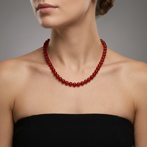 14 - A Gorgeous Carnelian gemstone beaded necklace. Weight - 38 grams. 50 beautifuily matched stones, all... 