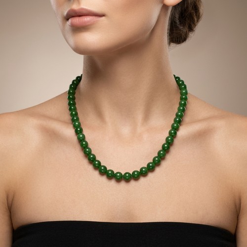 34 - A good quality Jade necklace with twist clasp. Weight - 68 grams. Stones cold to the touch. Please n... 