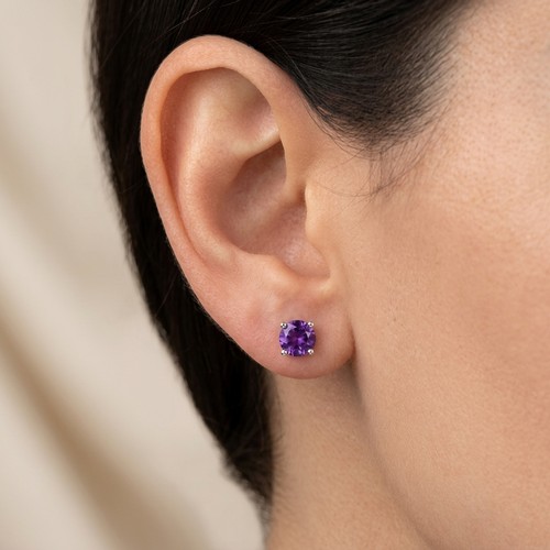 45 - Two pair of Sterling Silver Amethyst and Citrine stud earrings. Total weight - 1.97 grams. Please no... 